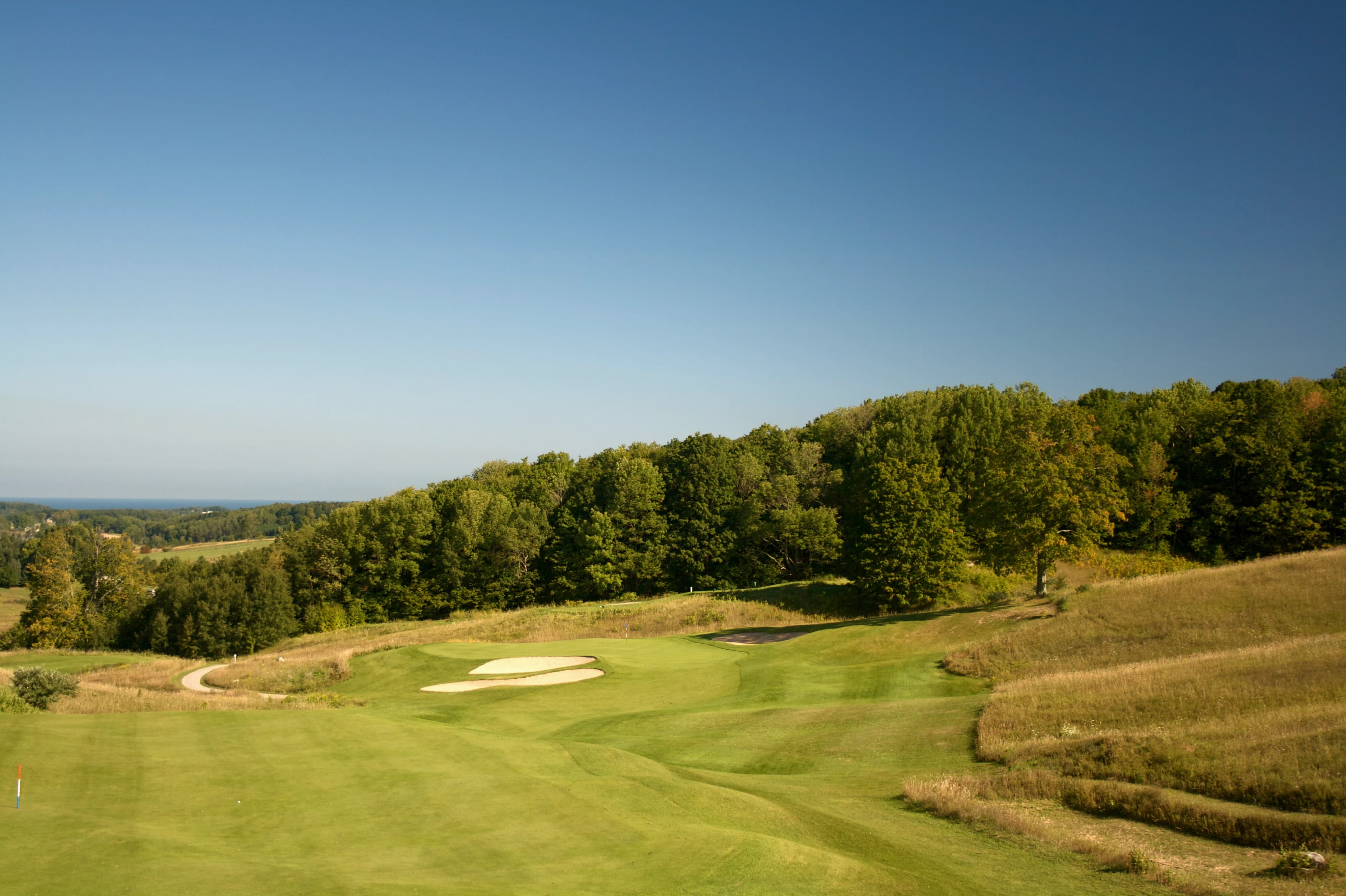 Dunmaglas Golf Club in Charlevoix, Michigan — public, 18-hole golf course, designed by Larry Mancour