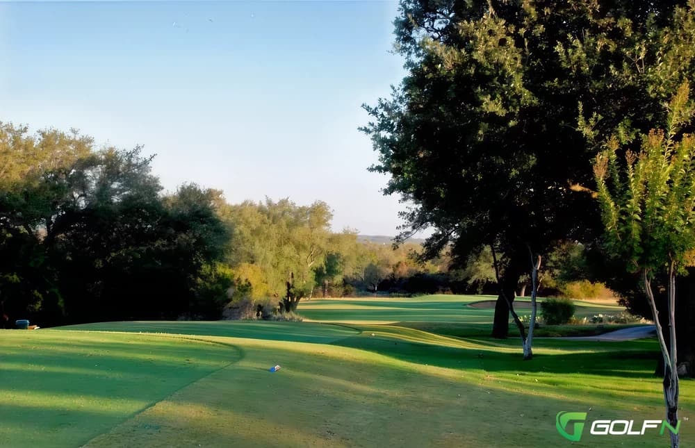 Delaware Springs Golf Course in Burnet, Texas — public, 18-hole golf course, designed by Another interesting design twist involved placing the signature hole as the opener. Playing 504 yards to a par 5, no. 1 is best attacked with an iron into the left side of a sloping, tree-lined fairway. The creek cuts into the landing area, making it a testy tee shot. The second shot must bend around the dogleg to the left and over the creek, and the approach is into the green shaded by large trees on the right.